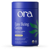 Polvo verdes de Ora Organic en frasco listo para batidos.
