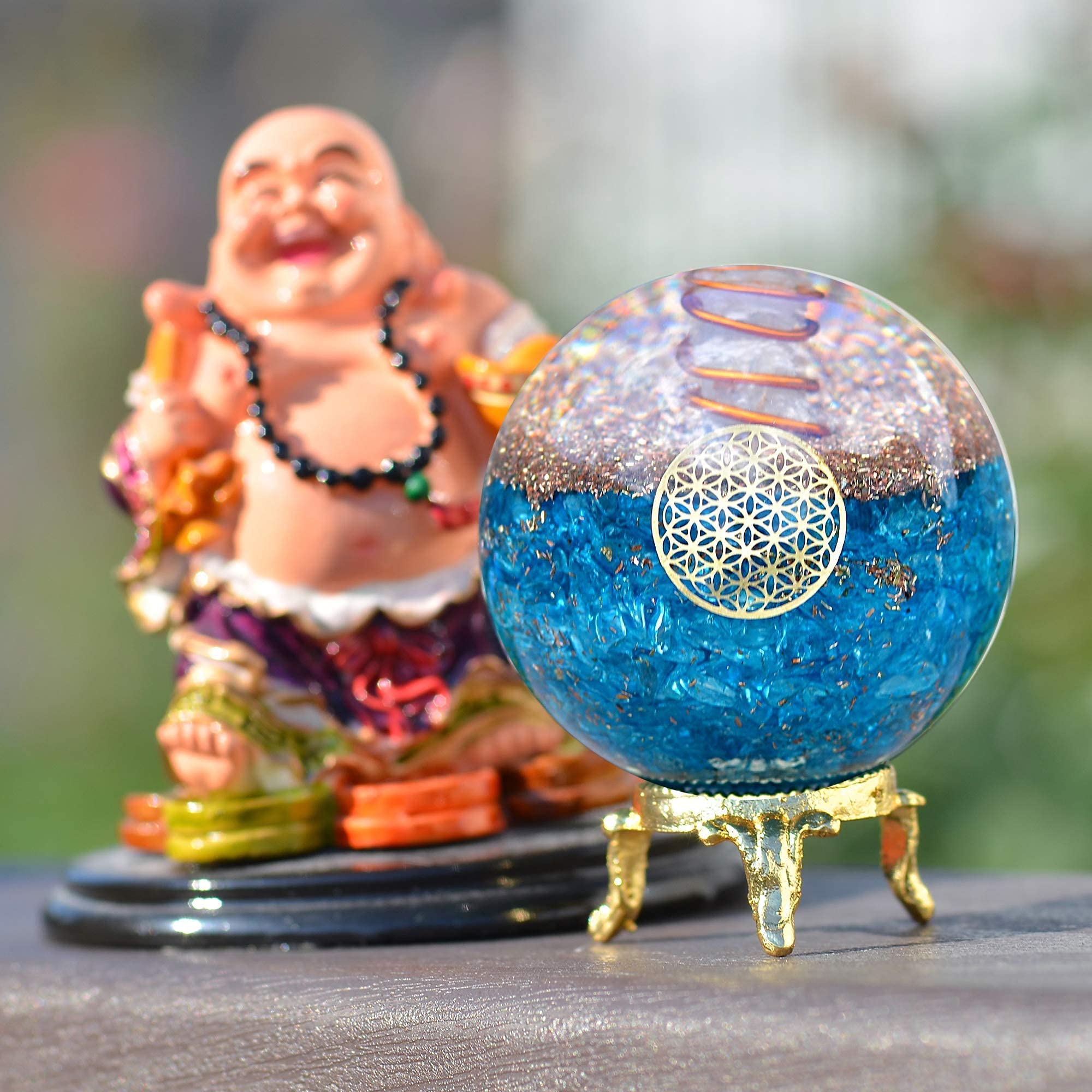 Orgonite Crystal símbolo Flor de la Vida visible en diseño artesanal.