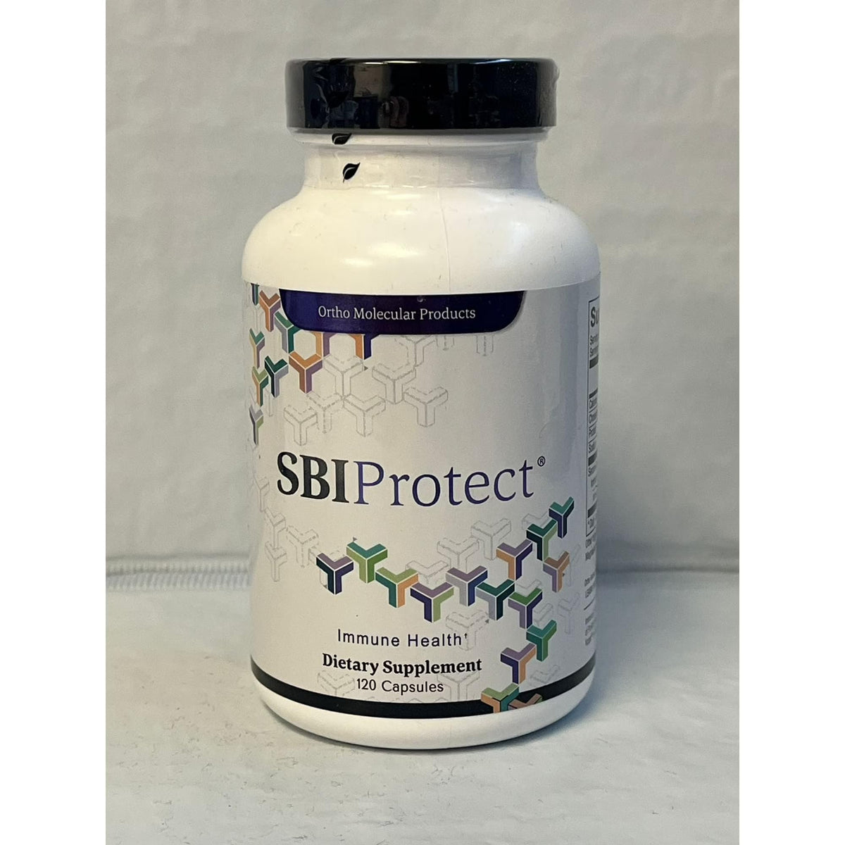 Ortho Molecular SBI Protect: botella de cápsulas para apoyar la inmunidad intestinal.