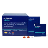 Orthomol Vital M polvo y tabletas frontal: impulso diario de energía.
