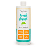 Oxyfresh enjuague bucal con frescura mentolada para un aliento duradero.