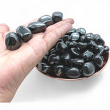 Pachamama Essentials hematita piedra pulida oval, puede aumentar energía y magnetismo personal.