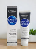 Dientes relucientes tras Pearl Drops carbón activado, sensación de frescura.