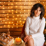 Vela Peytanger de peonía naranja con diseño artístico pastel