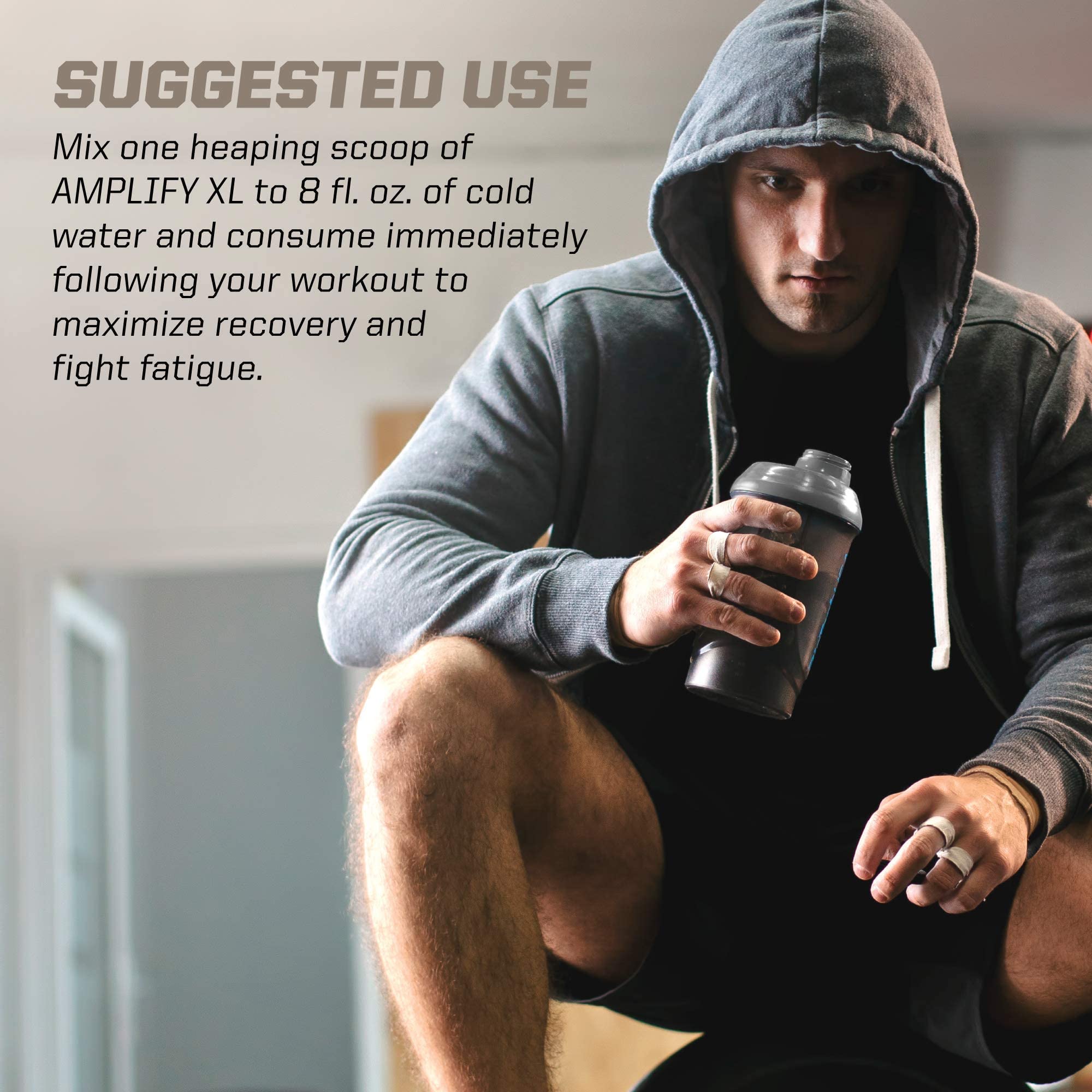 PMD Amplify XL escena de gimnasio preparando un batido