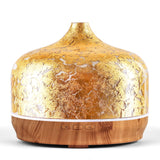 Porseme difusor de vidrio 500ml con acabado dorado para ambientes amplios.