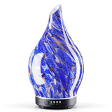 Difusor Porseme de vidrio azul para un ambiente relajante en casa.