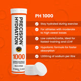 Tabletas Precision Hydration 500mg/litro en vaso, hidratación equilibrada.