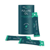 Primal Life Organics Real White Pulling Oil con coco y menta para frescura.