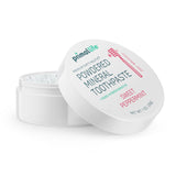 Primal Life Organics Dirty Mouth Toothpowder en envase, limpieza suave al cepillar.