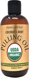 PRIME NATURAL botella de aceite de coco y menta para cuidado bucal natural.