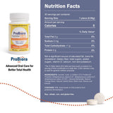 ProBiora Kids, tabletas masticables naranjas para apoyo dental infantil.
