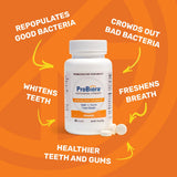 Probiora Health tabletas naranjas vistas de cerca, equilibrio de bacterias en boca.