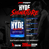 ProSupps Mr. Hyde Signature cuchara medidora junto al polvo listo para mezclar