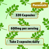 Cápsulas de Puranicals Moringa Premium visibles en la palma.