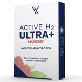 Purative Active H2 Ultra tableta frambuesa dissolviéndose en agua para hidratación refrescante