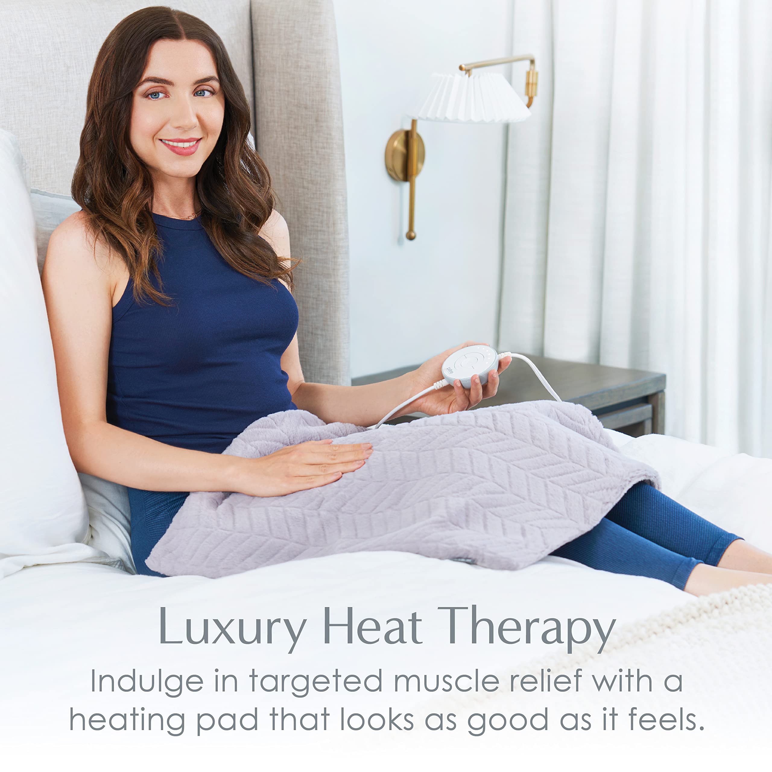 Pure Enrichment PurRadiance, control circular con luz para ajustar calor.