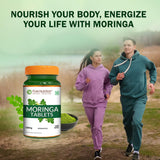 Pure Nutrition Moringa 1200mg, botella sobre mesa, fácil de incorporar en la rutina.