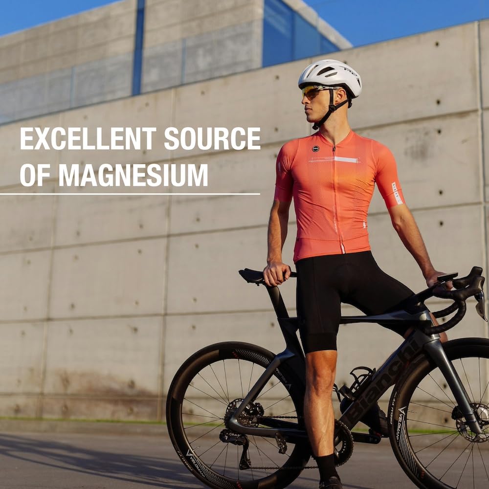 Puregen Labs Magnesio 400mg cápsulas en mano: apoyo a la función muscular.