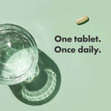 Rainbow Light Multivitamin Women’s One, envase abierto mostrando el polvo dentro.