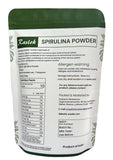 Raslok Espirulina en taza, ideal para vida activa y hábitos saludables.