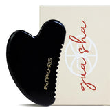 Guasha de obsidiana Rena Chris, vista frontal, favorece relajación facial y circulación