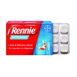 Rennie tabletas de menta en mano para uso en la marcha.