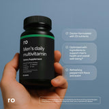 Ro Daily Multivitamin para Hombres, tabletas en primer plano, acceso a 23 nutrientes.