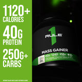 Escena de gimnasio con Rule 1 Proteins Ganador de Masa para apoyar entrenamiento.
