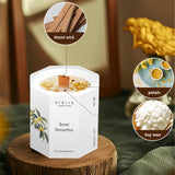 Vela RYWLYQ Osmanthus encendida con mecha de madera crepitante para calidez.