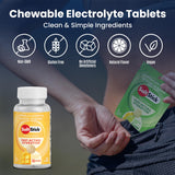 SaltStick FastChews mango en uso durante running al aire libre.