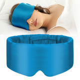 SECZIPE mascarilla de seda azul en primer plano, tacto suave y lujo para dormir