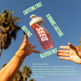 SEEQ Clear Whey Isolate Watermelon Wave kitchen counter with an ice-ready shake
