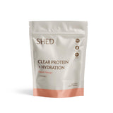 Shed Nutrition Clear Protein con electrolitos durazno-mango para hidratación rápida.