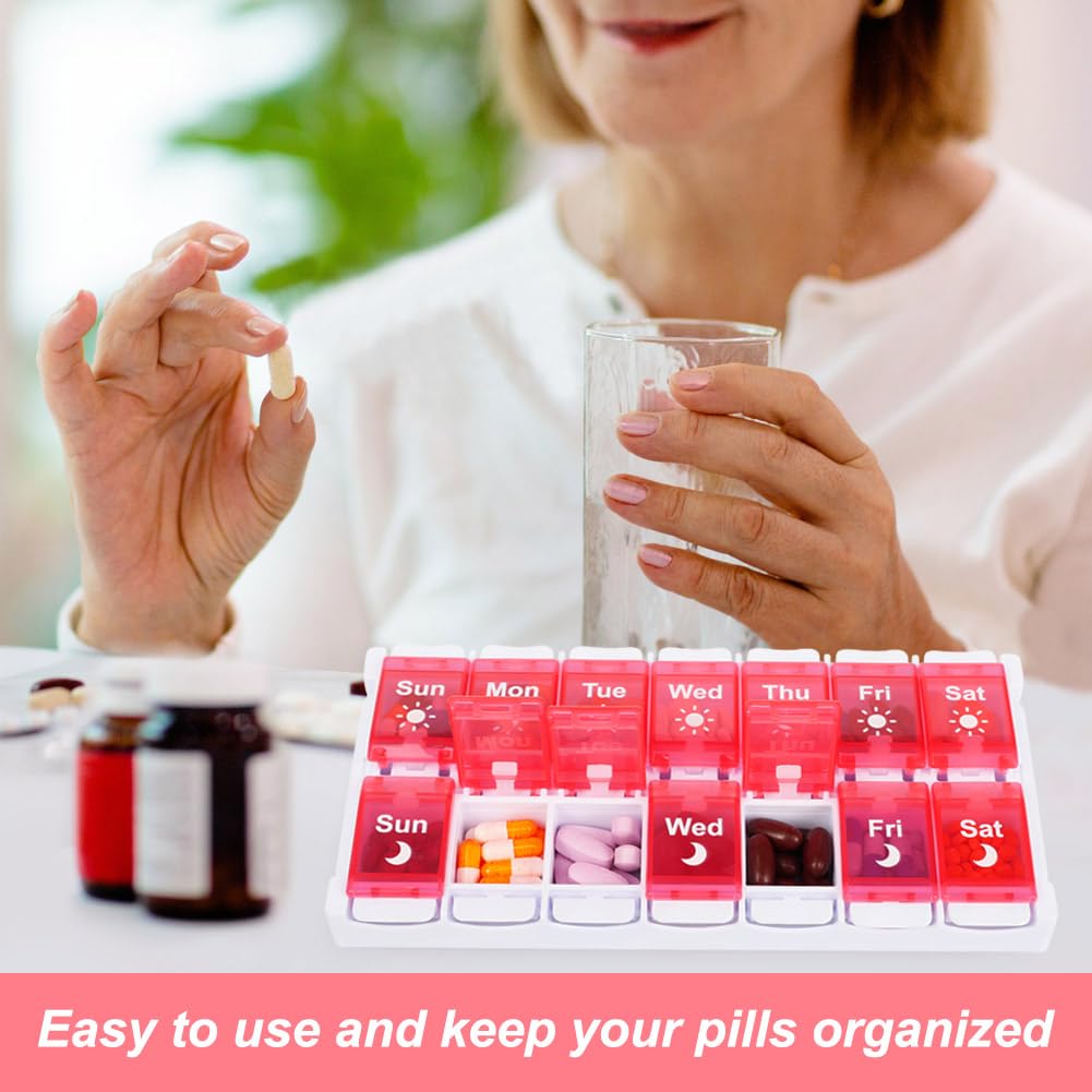 Shintop organizador rosa para pastillas en la mesa de casa