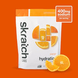 Vaso con Skratch Labs naranja para mantener hidratación durante sesiones