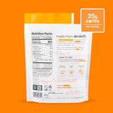 Polvo de electrolitos de fruta real en frasco naranja para mezclar