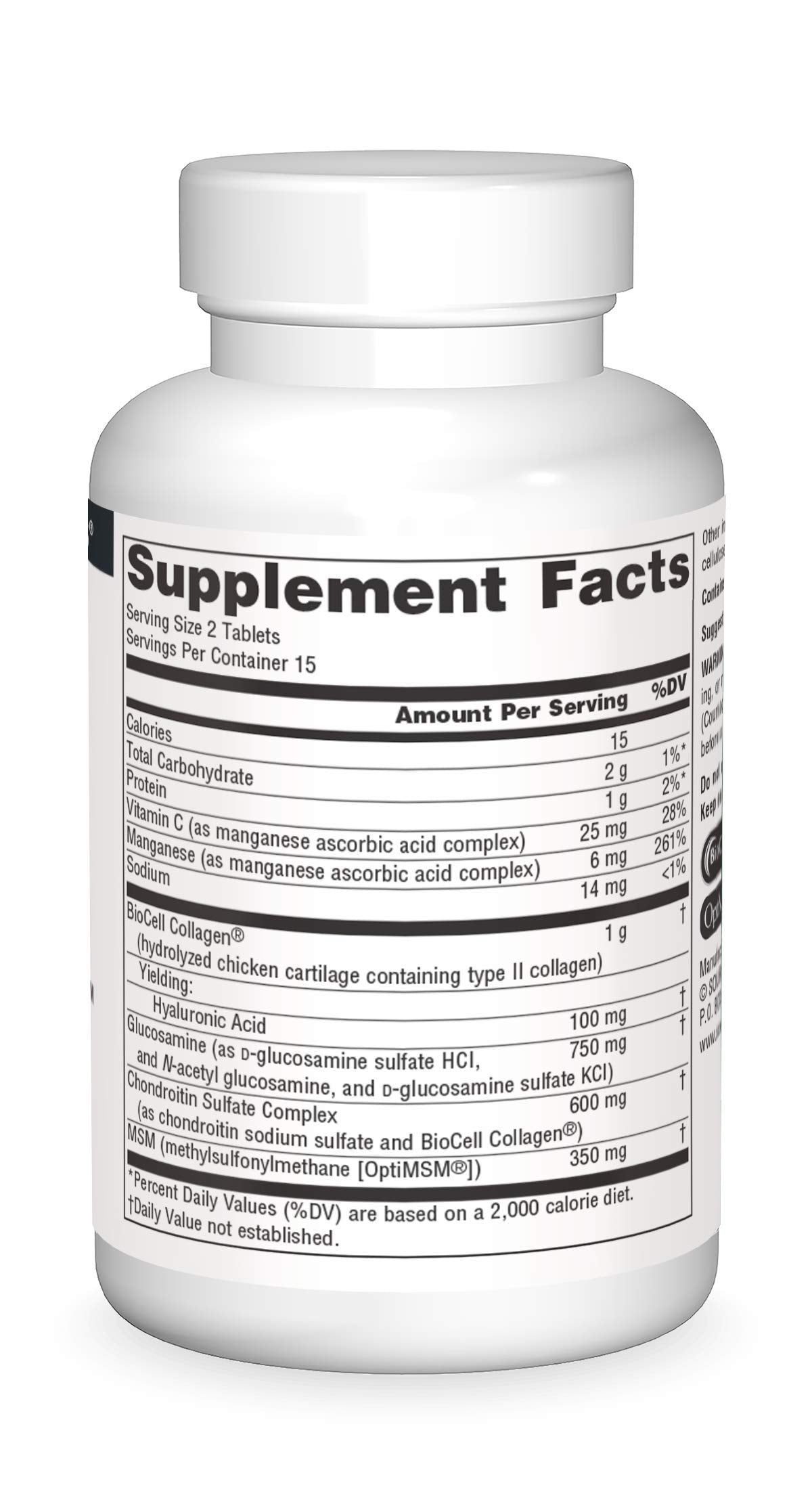 Source Naturals Tabletas en vista cercana sobre mesa.