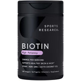 Sports Research Biotina 2,500 mcg en botella con aceite de coco para piel y cabello.