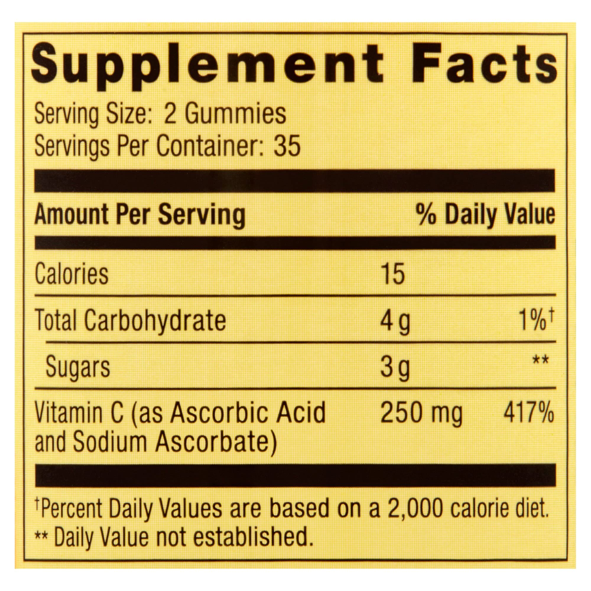 Spring Valley gominas Vitamina C 240 mg, envase abierto mostrando la textura naranja.