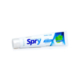 Spry pasta dental con xilitol en empaque de menta, experiencia refrescante.