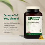Standard Process Cod Liver Oil capsules close-up—detailed view of the omega-3 content.