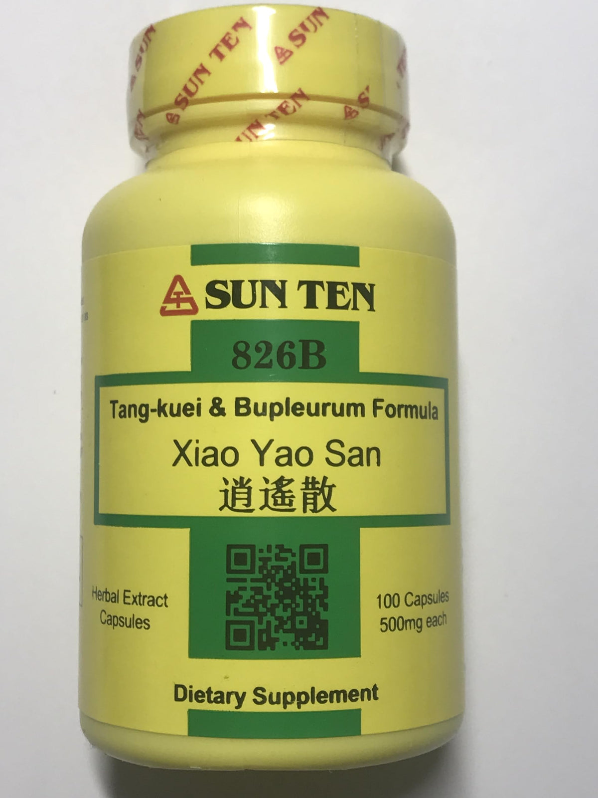 Sun Ten Tang-Kuei y Bupleurum frente al frasco, para equilibrio diario.