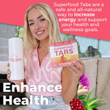 Superfood Tabs: vaso con bebida de fresa limón lista para tomar.