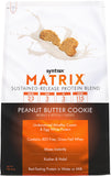 Syntrax Matrix con trozos de galleta mantequilla de maní, snack proteico sabroso.