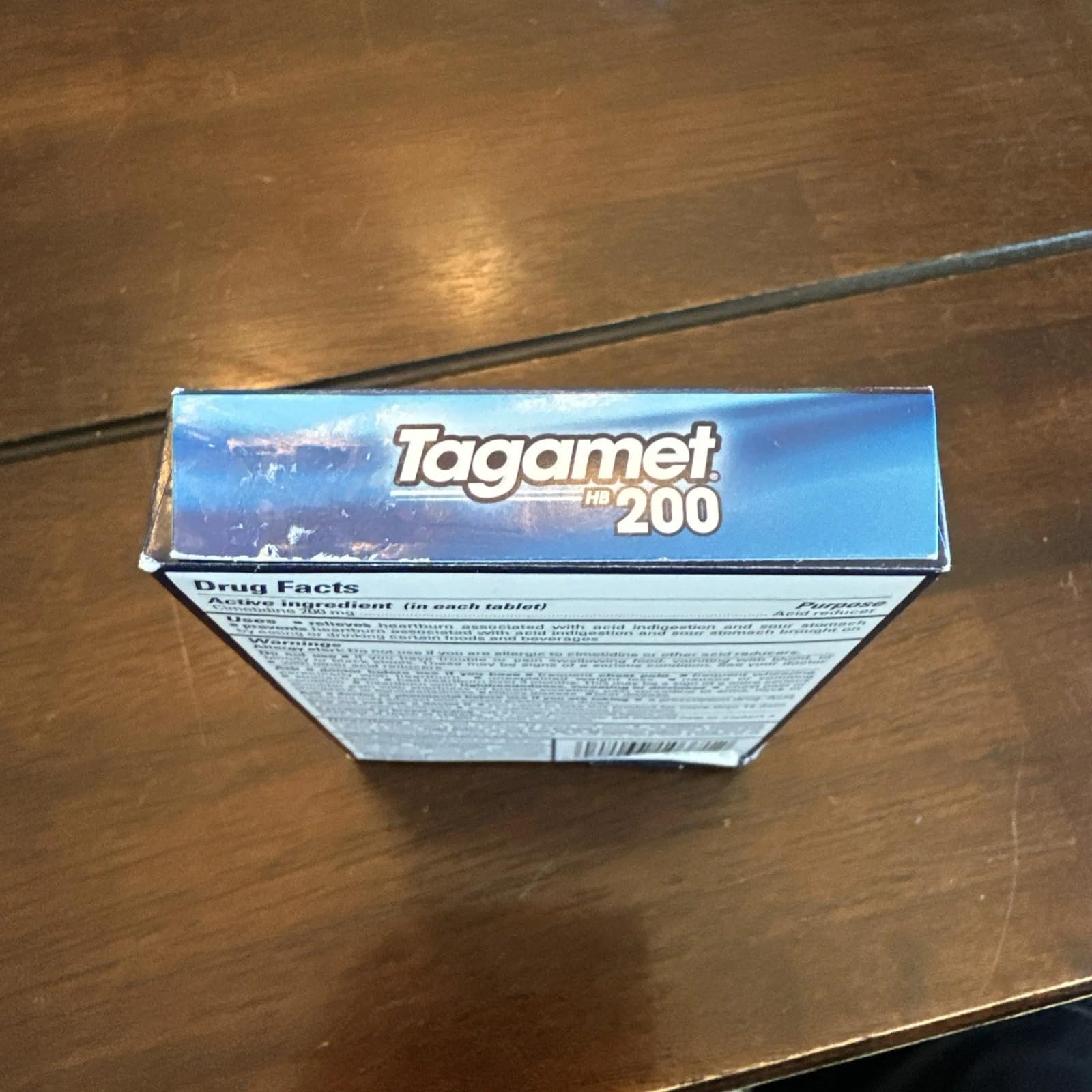Uso cotidiano de Tagamet HB 200 mg para alivio ocasional de malestar estomacal.