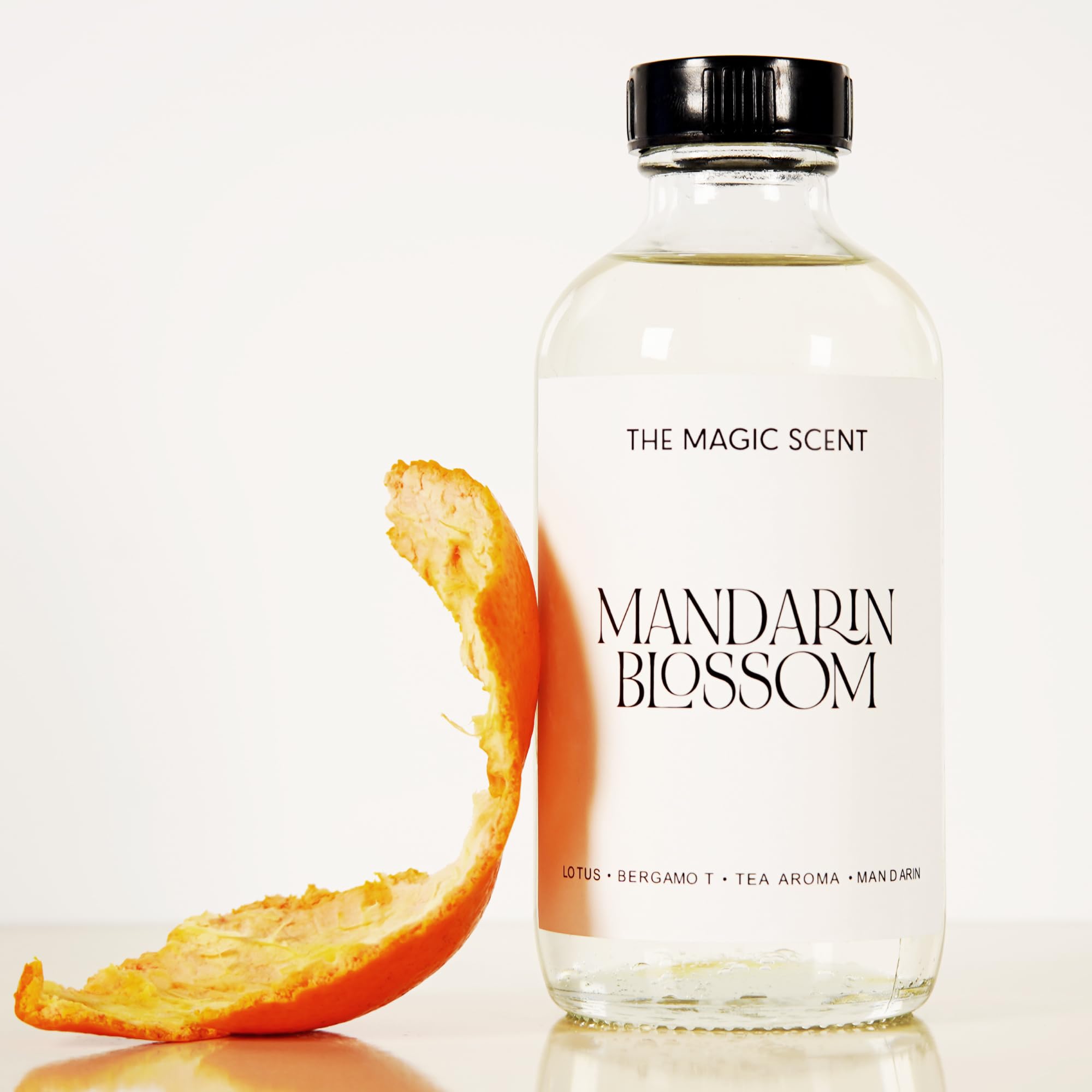 THE MAGIC SCENT envase de vidrio elegante para difusor.