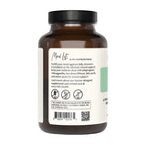 Mind Lift de The Wellness Company, cápsulas en la mano, formato fácil de incorporar