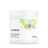 THORNE Amino Complex en bote limón, ideal para apoyar la masa magra durante el entrenamiento.