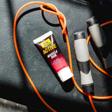 Tiger Balm Muscle Rub: etiqueta clara que destaca absorción rápida.